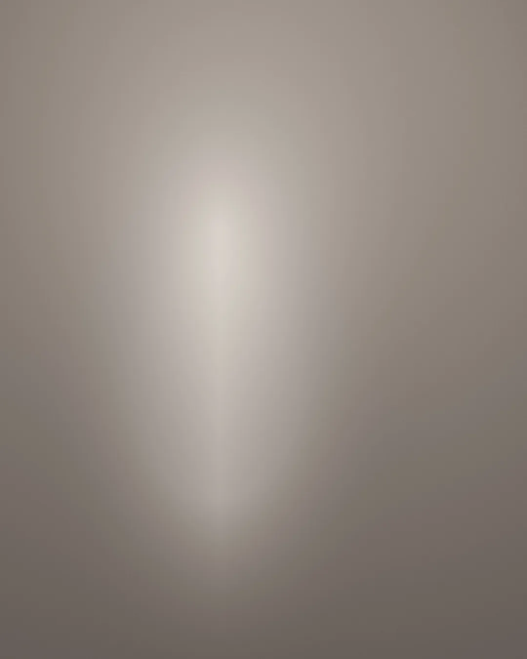 Backlit silhouette, steam rising from a cup